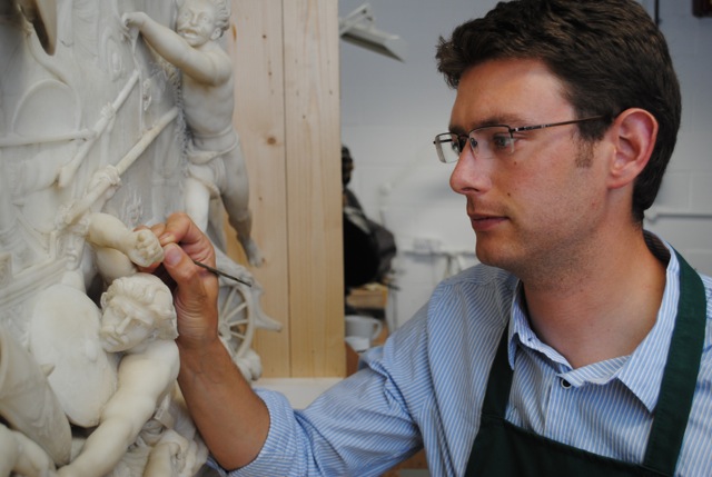 Felix Thornton-Jones working on a marble relief (sculptor - John Deare 1796) that is now in the collections of the V&A