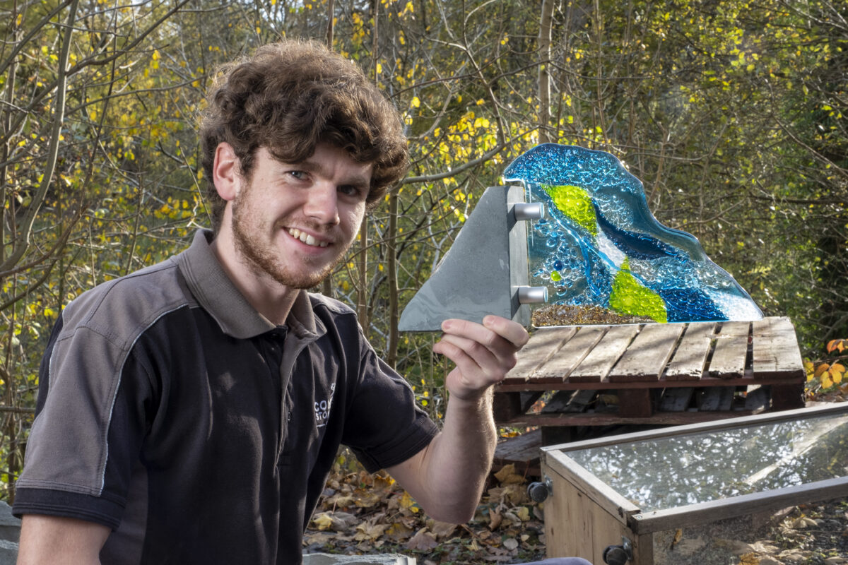 Coniston4LL Coniston quarry feature; words Mike Glover.
Coniston Stonecraft apprentice, Liam Cartmel-Walker with some of his finished artwork in glass and blue slate.
PICTURES By MILTON HAWORTH. November 12th 2021.