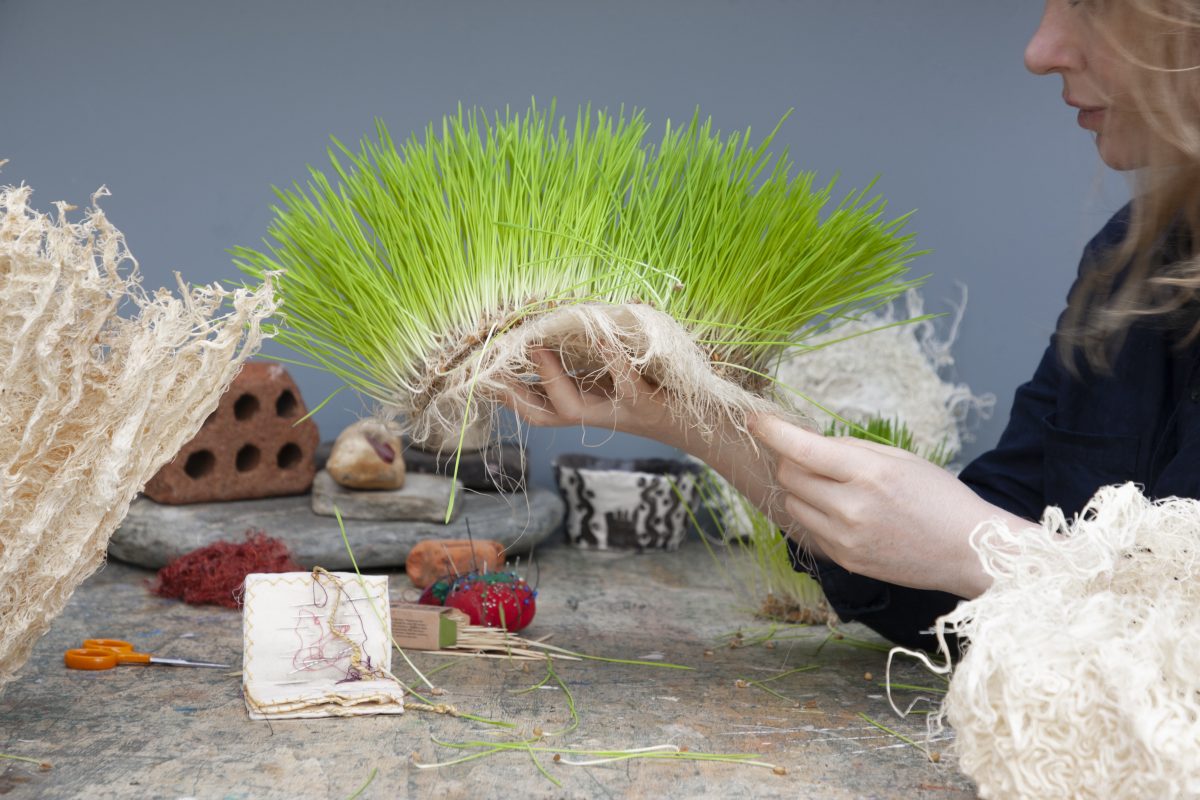 maker / artist in the studio, working with grass root Maker / Bio-designer, Zena Holloway, crafting root in the studio, London, UK