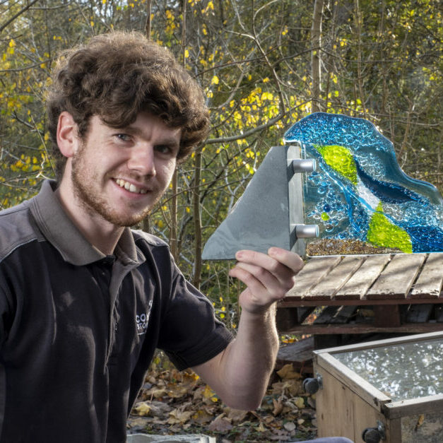 Coniston quarry feature; words Mike Glover.
Coniston Stonecraft apprentice, Liam Cartmel-Walker with some of his finished artwork in glass and blue slate.
PICTURES By MILTON HAWORTH. November 12th 2021.